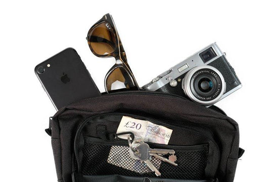 Rose design embroidered onto a Black Fanny Pack with two storage pockets - doomsdayco Rose Black Fanny Pack filled with items