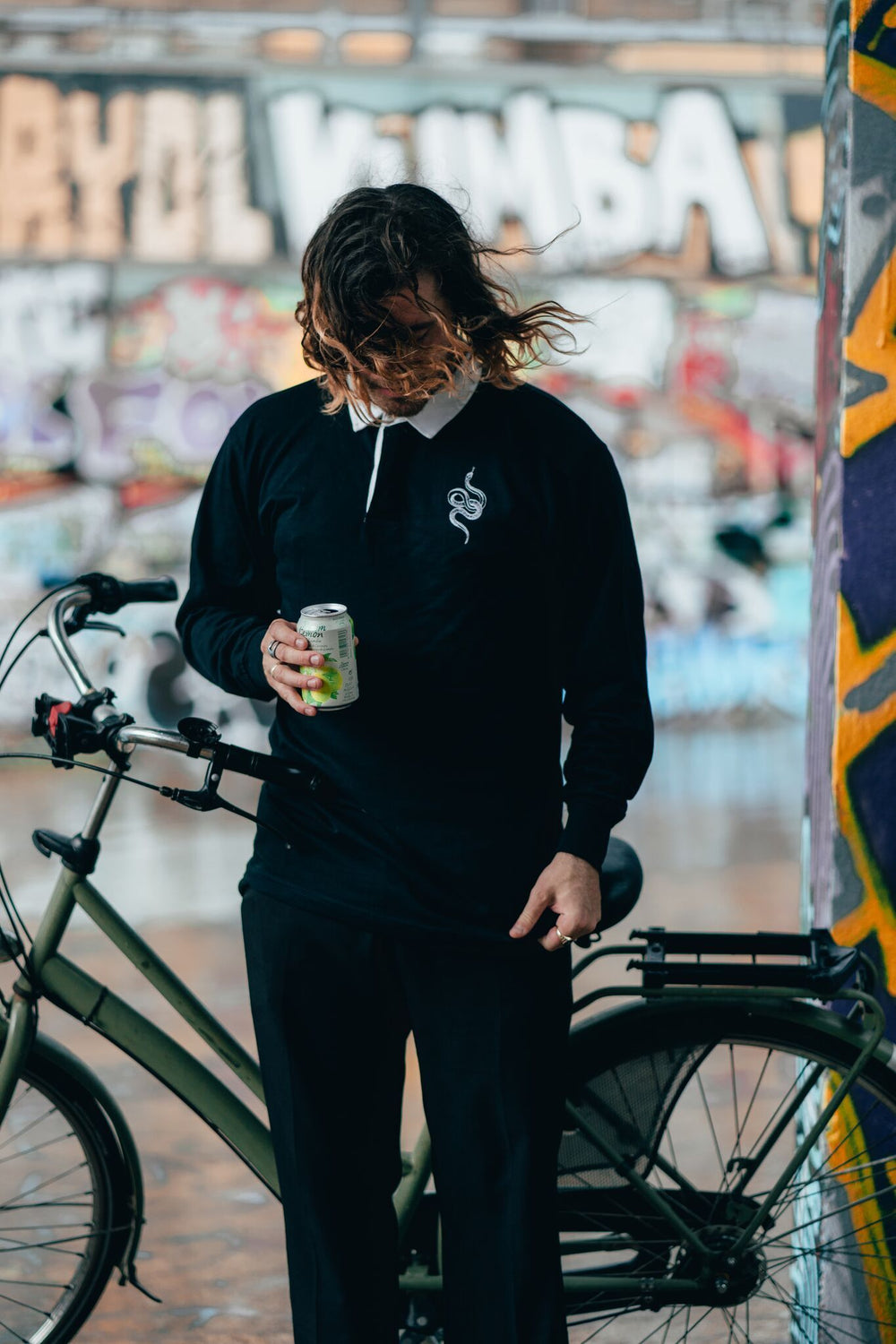 Model wearing Embroidered button up Snake Rugby Jersey Black - doomsdayco Snake Rugby Jersey - Black front